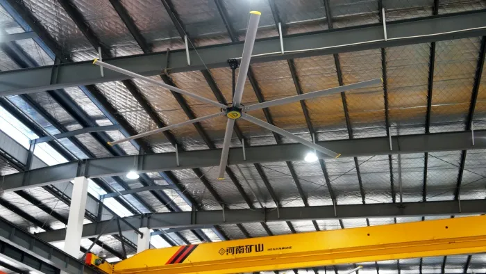 24FT six blade outdoor ceiling fan installed under the roof of a large open-sided industrial workshop